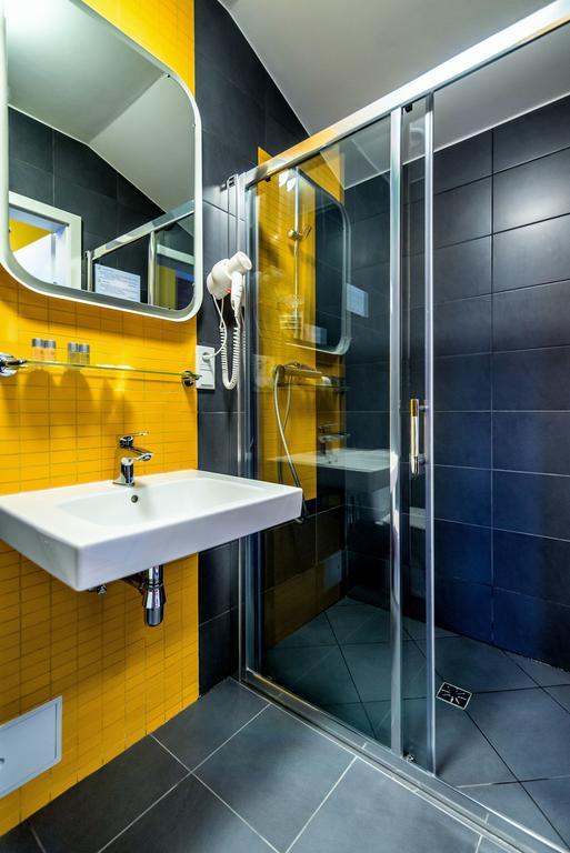 Tamada Aparthotel Ozorków Rum bild